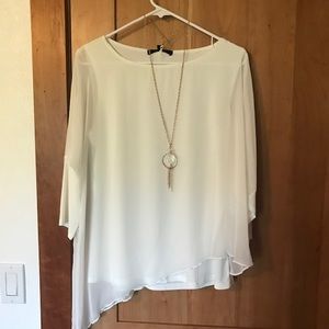 NWOT asymmetrical white sheer top with white under layer and necklace detail M